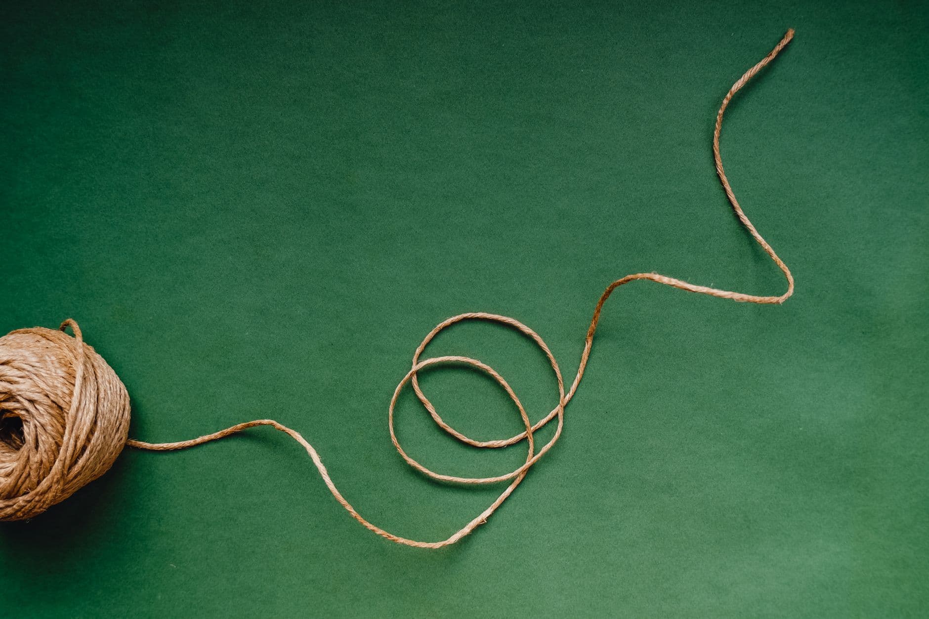A ball of natural twine with a loose end